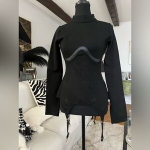 Maniere de voir suspender detail top